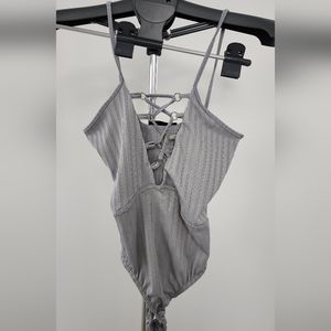 Missguided lace up grey body suit size 4